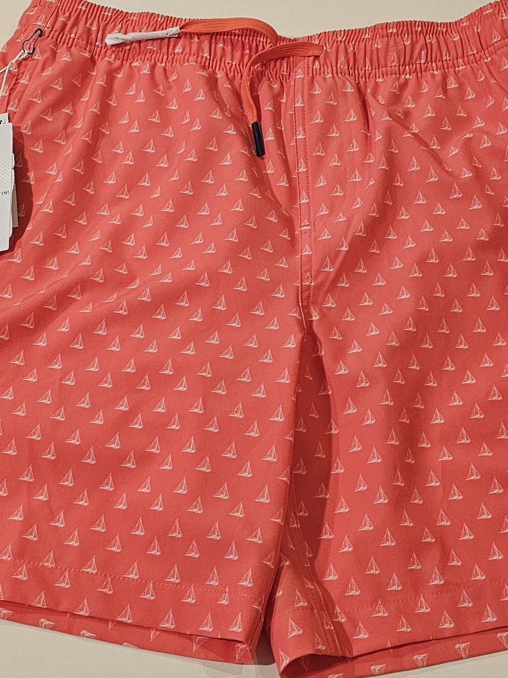 Southern Tide Kids Coral Swim Trunks with White Sailboat Print